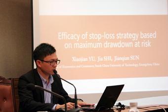 Associate Professor Yu making a keynote speech