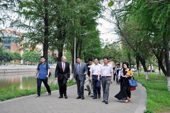 Showing Prof. Sargent around the campus